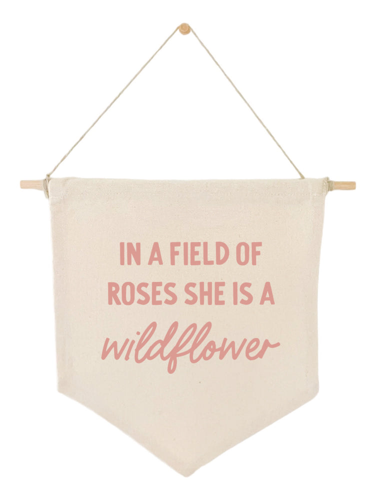 In a field of roses she is a wildflower Banner