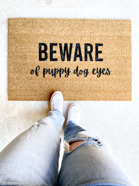 Beware of Puppy Dog Eyes Mat